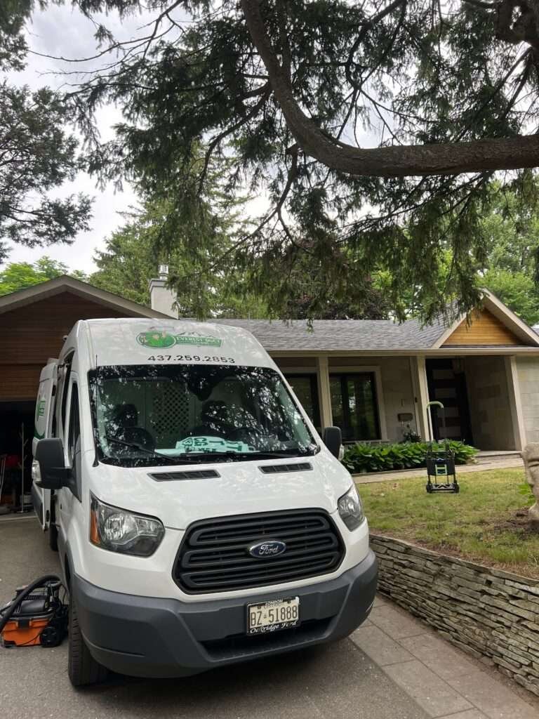 Service van parked outside ready for air duct cleaning.