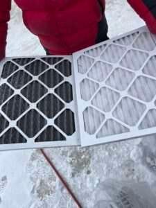 Comparison of a dirty air filter vs. a clean air filter after professional cleaning.